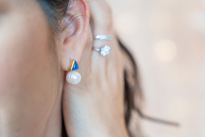 BA delicate pearl and lapis lazuli earrings. Reach for a delicate and exquisite earring that plays with lapis lazuli stone and a beautiful pearl.