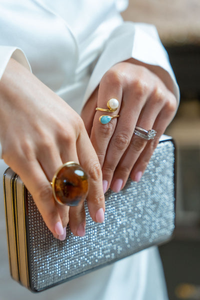 Ba delicate pearl and larimar stone gold-plated sterling silver ring. Reach for a delicate and exquisite ring that plays with larimar stone and a beautiful pearl.